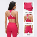 Contrast color yoga suit women's bubble wrap anti-sagging fitness bra high waist peach hip nine-point sports pants two-piece set