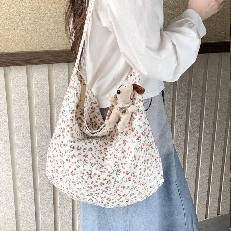 Cross-border new broken flower canvas bag messenger bag shopping bag fashion trend large capacity casual versatile women's shoulder bag