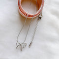 [no need to take off when taking a bath] hollow bow titanium steel necklace 2024 new trendy design hollow clavicle chain