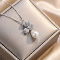 8442 pearl and diamond tassel flower steel necklace