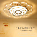 Modern minimalist wavy lotus ceiling light - gold trim, irregular cloud design - perfect for living rooms, master & guest bedrooms