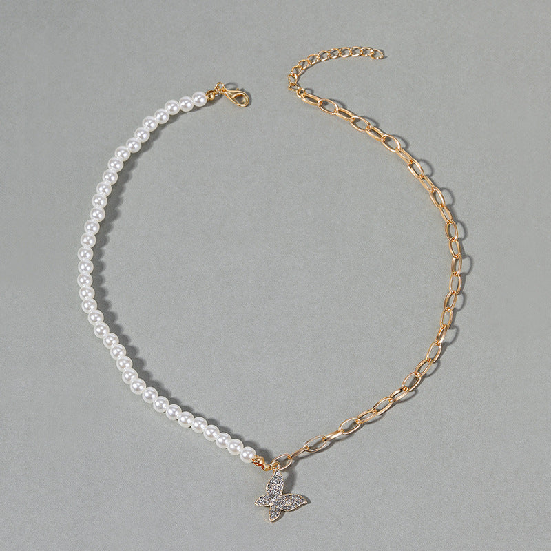 Wholesale korean-style necklace: trendy ins jewelry for autumn/winter. versatile, diamond-studded butterfly pearl sweater necklace with a chic, chanel-inspired design for women