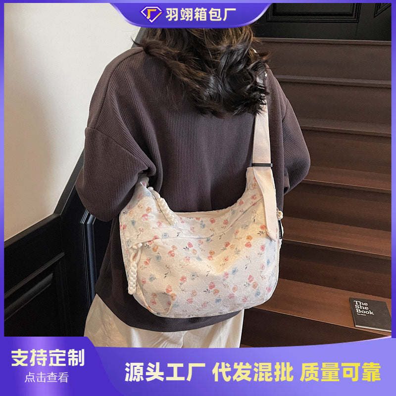 Foreign order niche floral dumpling bag women's 2025 new versatile shoulder bag versatile large-capacity casual messenger bag