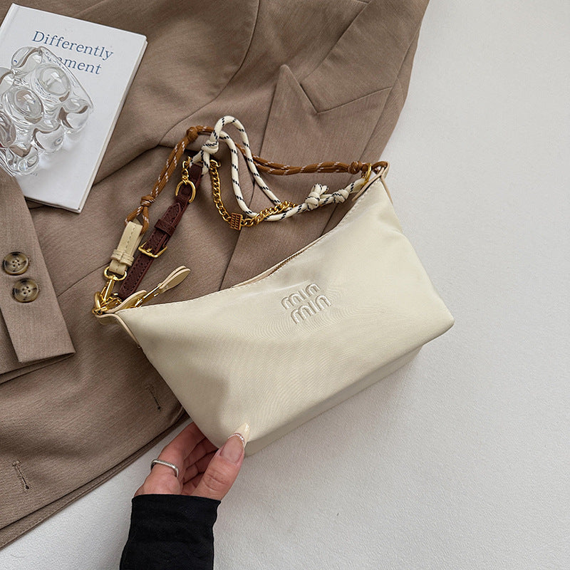 Internet celebrity trend shoulder bag 2025 summer new contrasting color canvas small lunch box bag commuter fashion trend handbag