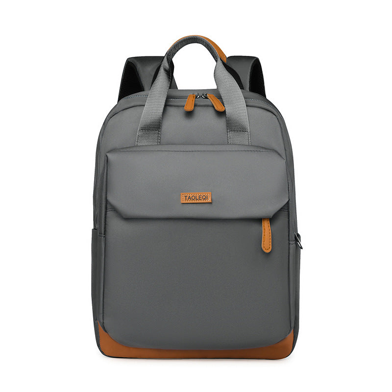 New large-capacity simple travel backpack, lightweight and trendy college student schoolbag, fashionable business commuter backpack.