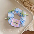 Blue sweet floral bow scrunchie hair tie - wholesale hair bands for ponytails, buns, and updos