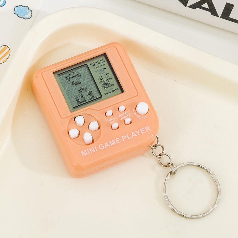 Pocket tetris game console - creative mini electronic game console keychain - nostalgic stress relief toy