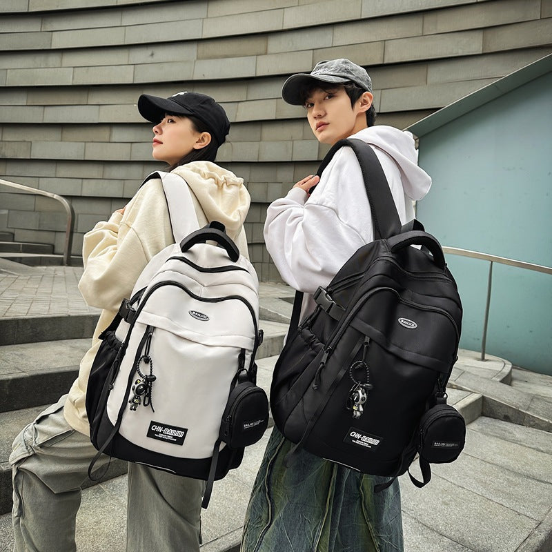 New large-capacity backpack, junior high school student schoolbag, men's and women's casual backpack, printed color schoolbag, student