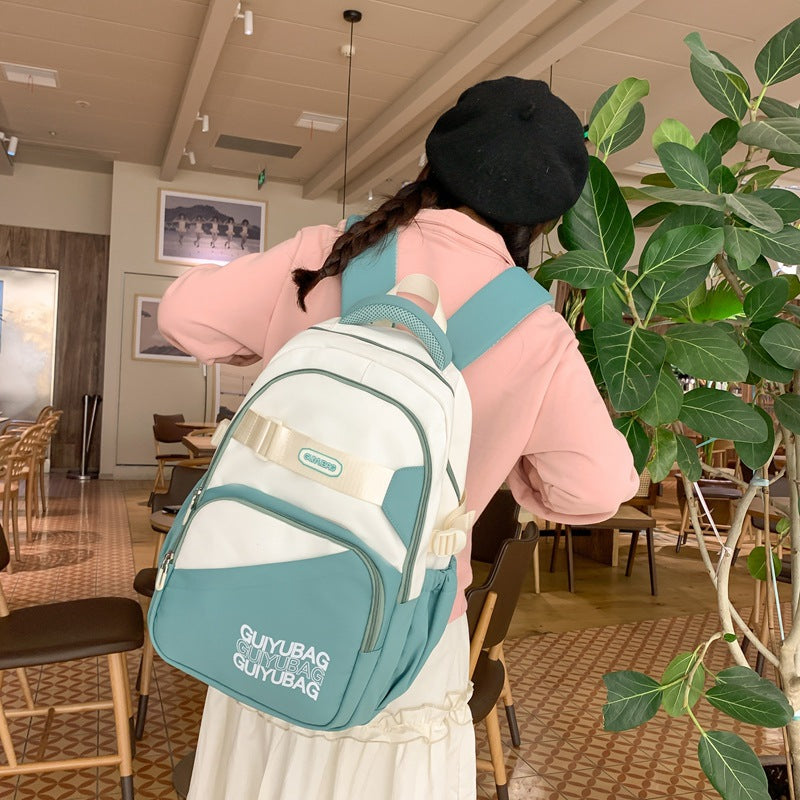 Backpack New fashion junior high school college student schoolbag Large capacity lightweight backpack Simple texture backpack