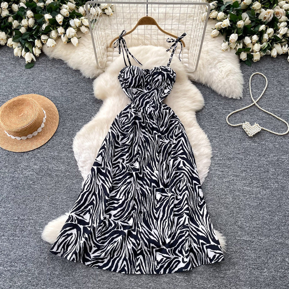 French-inspired floral print camisole dress for women, perfect for summer. korean style, sleeveless, high-waisted a-line silhouette, slimming and elegant maxi dress