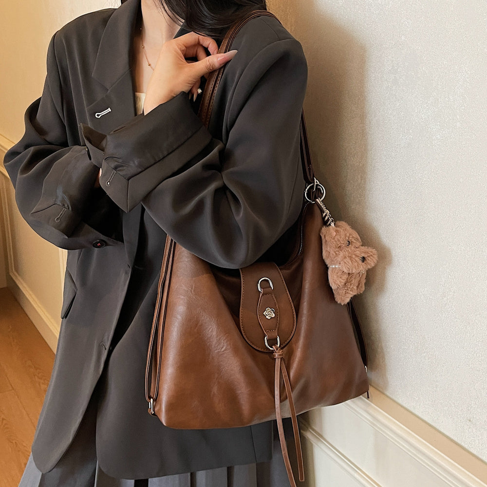 2025 new autumn/winter designer leather belt handbag - large capacity, versatile fashion backpack, shoulder bag, and crossbody bag