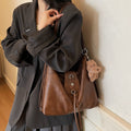 2025 new autumn/winter designer leather belt handbag - large capacity, versatile fashion backpack, shoulder bag, and crossbody bag