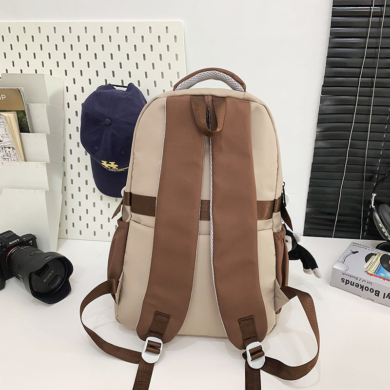 New student schoolbag ins contrasting colors, junior high school, college student schoolbag, large-capacity couple model, lightweight burden-reducing backpack
