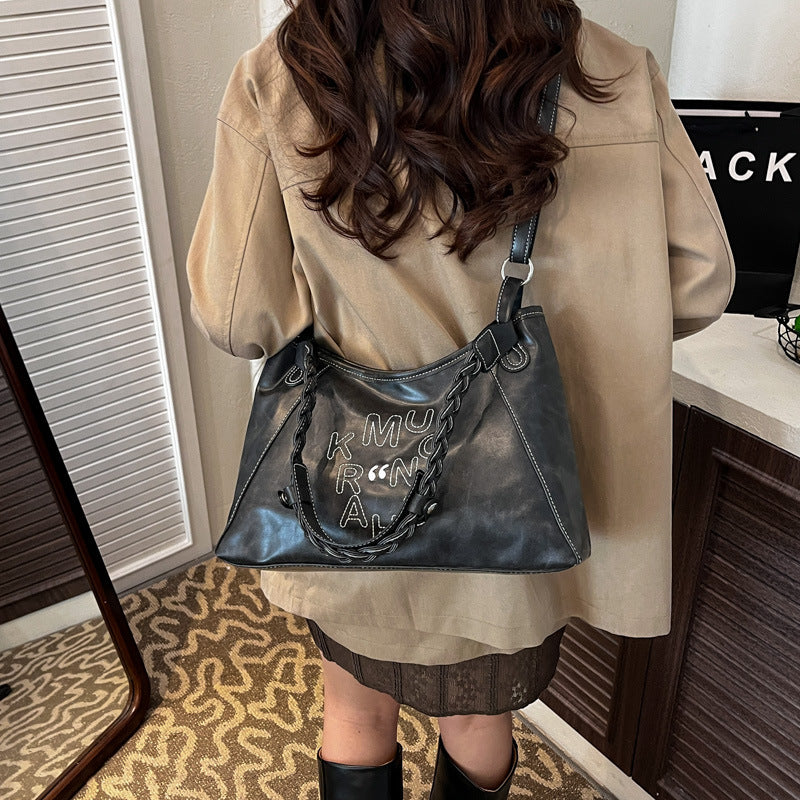 Korean-inspired, effortlessly chic, and uniquely designed shoulder bag for women. new for 2025, this high-end, sophisticated underarm bag offers a spacious tote capacity