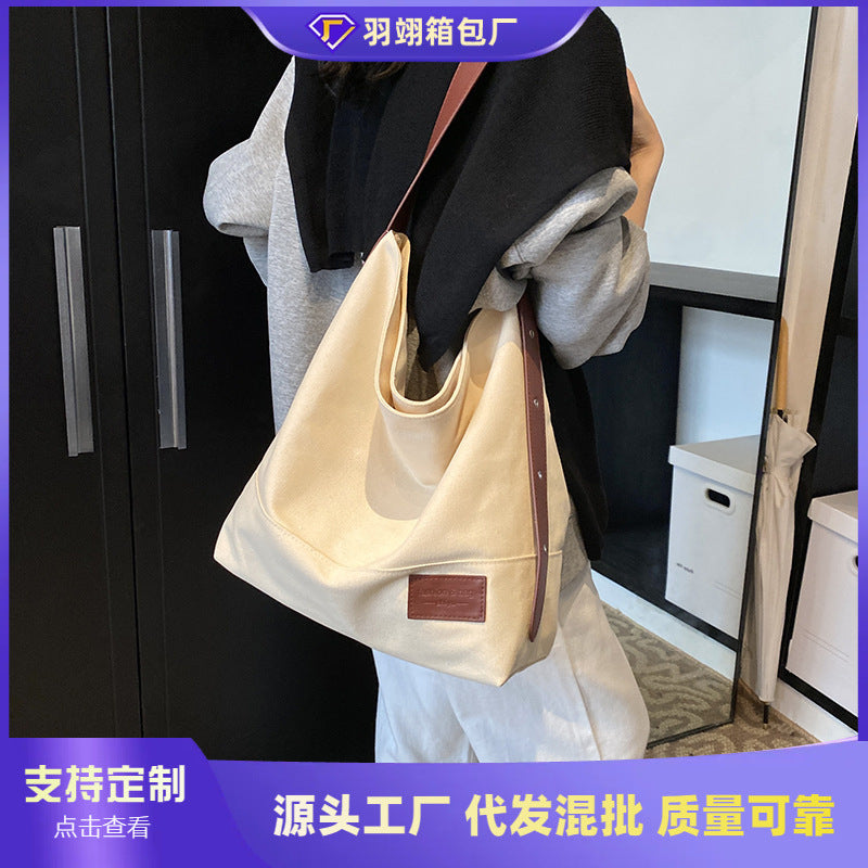 Foreign trade leisure large-capacity canvas bag women's 2025 new versatile shoulder messenger bag college student tote bag