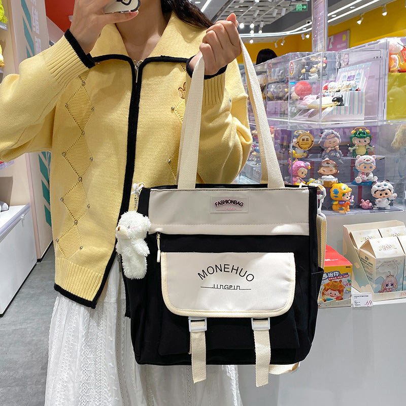 New primary school students tote bag, tutoring bag, tutoring bag, bag, high-value beauty, simple and versatile mailman bag, tote bag