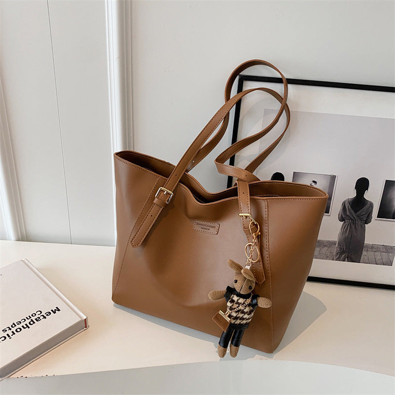Cross-border large-capacity bags, women's autumn and winter versatile 2025 new shoulder bag, college student class bag, commuter tote bag