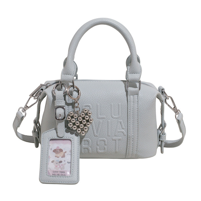 Fashion niche high-end sense embossed letter pillow bag 2025 new summer versatile color casual messenger bag