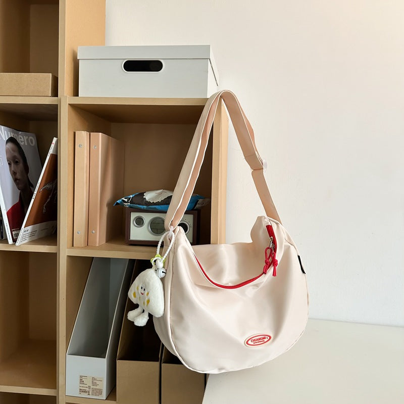 Foreign single nylon cloth bag women's large capacity 2025 new summer versatile shoulder messenger bag casual commuter dumpling bag