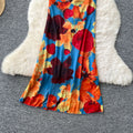 French-inspired, subtly sexy, open-back camisole dress with ruched waist, figure-flattering silhouette, and printed design – perfect for a vacation getaway