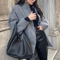 2025 new european and american style women's casual color block stand collar single-breasted large pocket loose fit comfortable long sleeve jacket