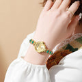 Mcykcy small dial gold alloy bracelet light luxury wrist emerald with surface style medieval watch women's quartz