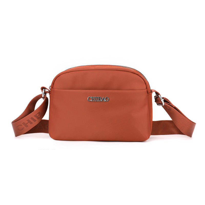 Foreign trade new lightweight messenger bag bag women's solid color simple nylon cloth casual shoulder bag portable commuter small square bag