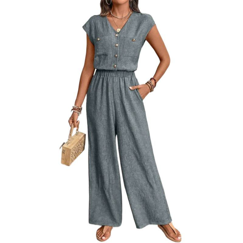 Women's v-neck short sleeve jumpsuit with button-front, elastic waist, wide leg, and pockets - perfect for everyday casual wear