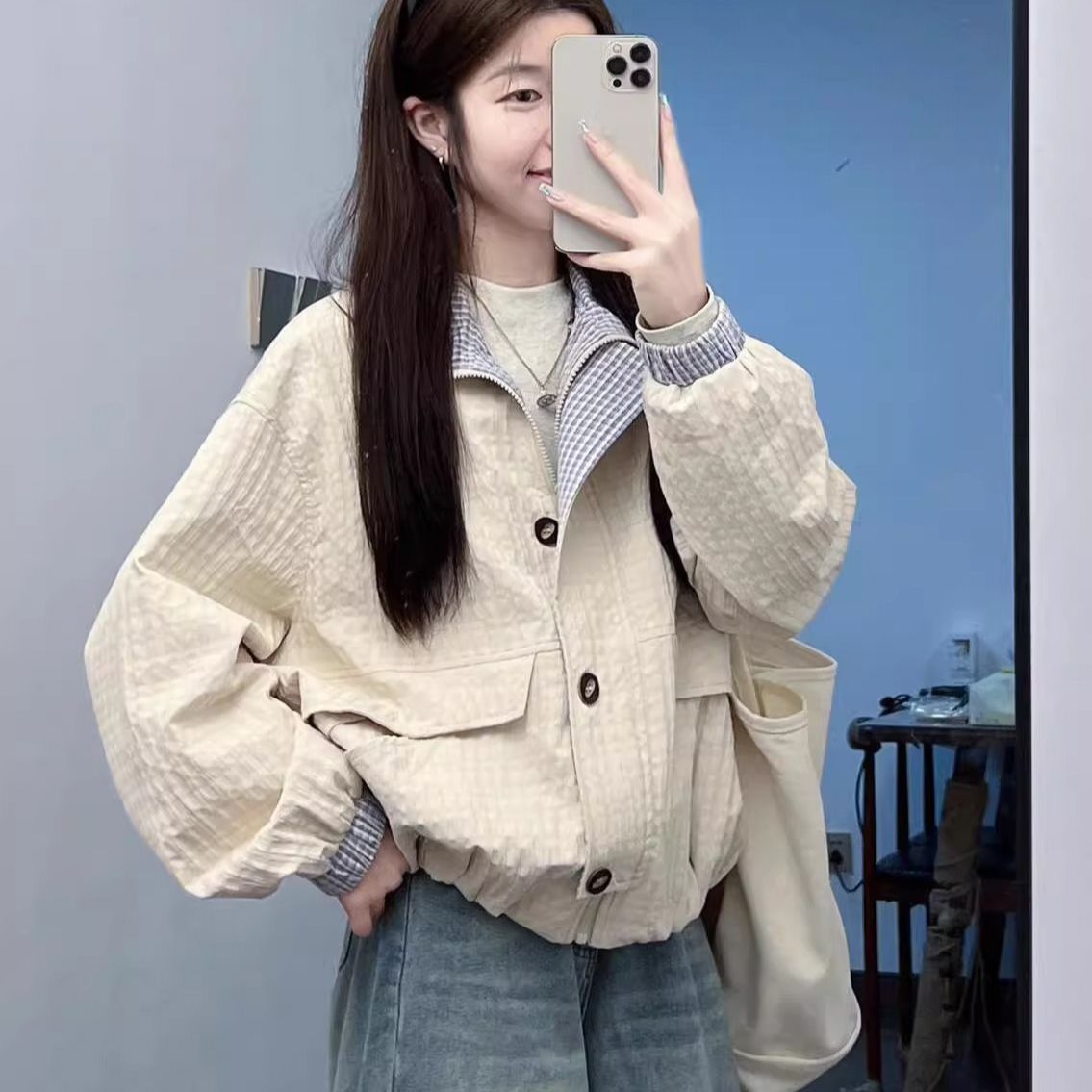 Retro loose contrasting coat women's 2025 early spring high-end niche design stand-up collar plaid short jacket top