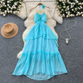 Beach vacation dress for women, atmospheric cut out, breast-revealing halter suspender, stereo flower, asymmetrical fairy long skirt