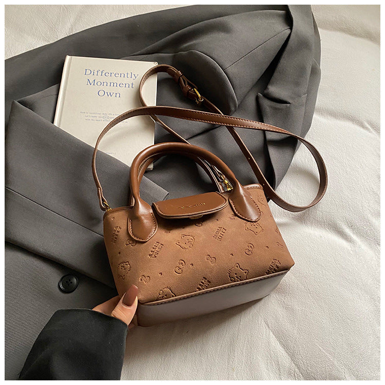 Simple and stylish crossbody bucket bag, 2025 autumn/winter vintage-inspired commuter casual bag, understated luxury niche handbag, shoulder bag