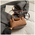 Simple and stylish crossbody bucket bag, 2025 autumn/winter vintage-inspired commuter casual bag, understated luxury niche handbag, shoulder bag