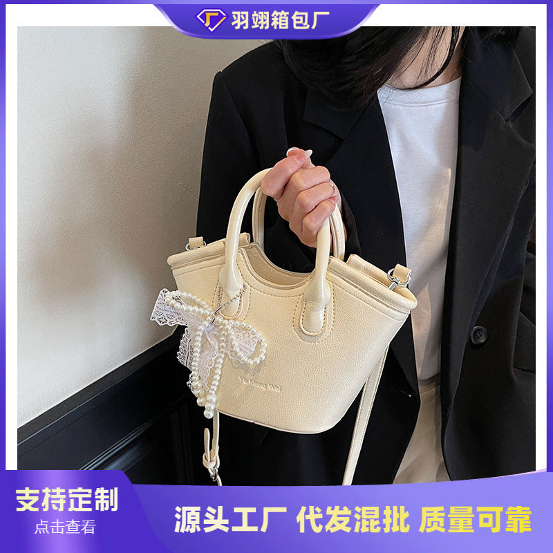 Cross-border texture contrasting handbag bag 2025 new fashionable versatile foreign gas bucket bag casual simple messenger bag