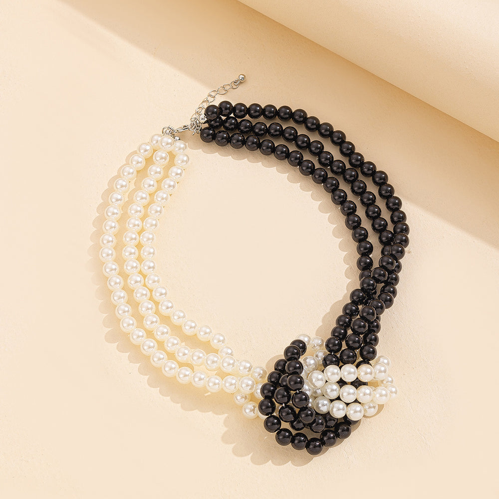 Multi-layered imitation pearl necklace wholesale, european and american fashion, artistic retro black and white color block jewelry, high-end women's choker