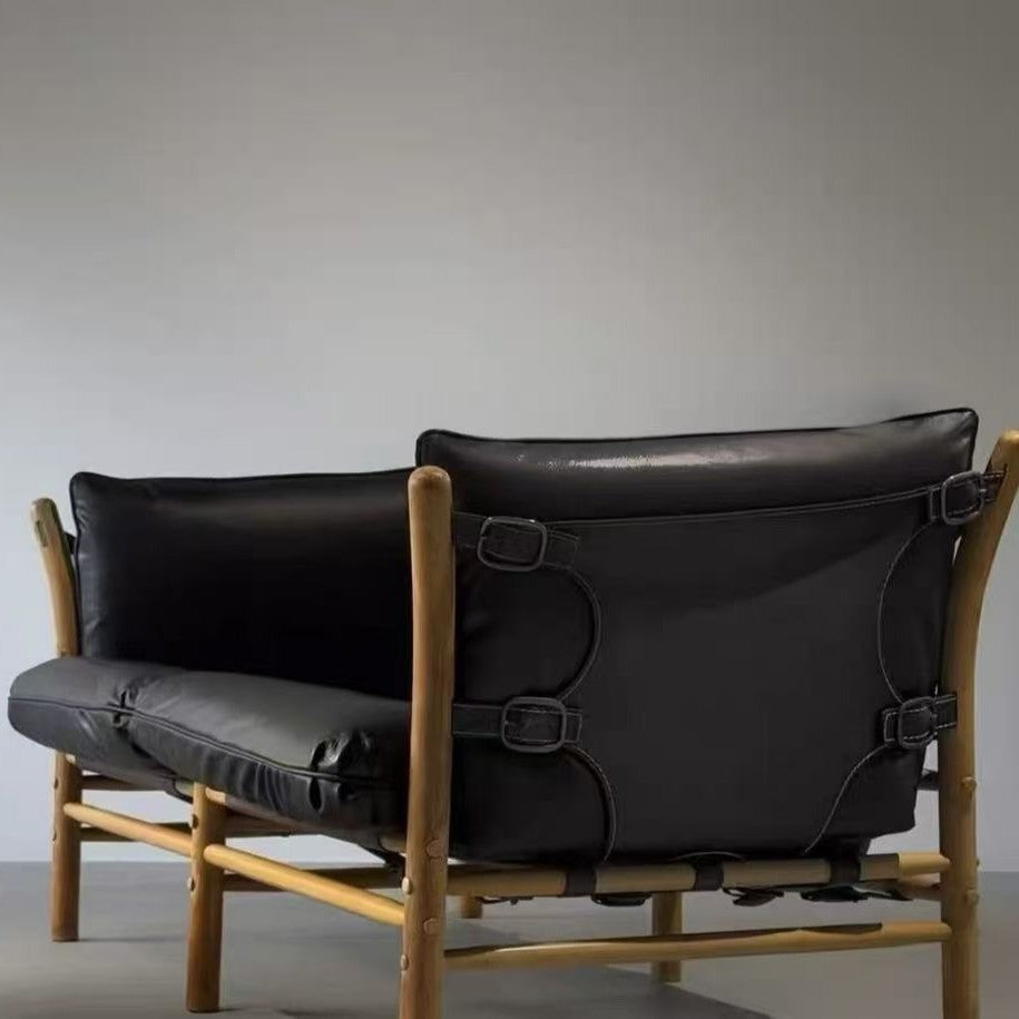 Leather upholstered designer solid wood b&b living room saddle leather chair wabi-sabi style sofa frameless b&b commercial