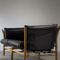 Leather upholstered designer solid wood b&b living room saddle leather chair wabi-sabi style sofa frameless b&b commercial