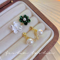 Camellia pearl stud earrings for women, 2026 new arrival, light luxury, high-end, elegant earrings, unique design, wholesale