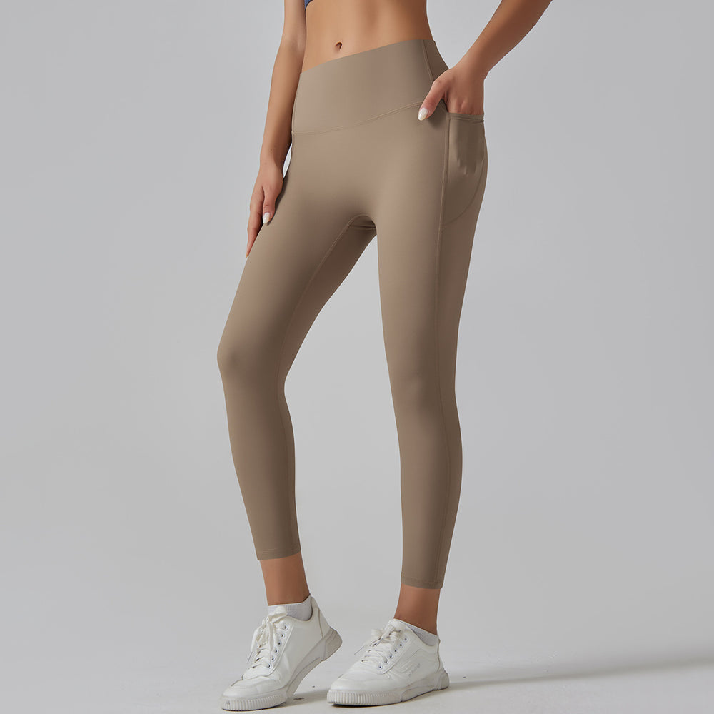 High-waisted, barely-there yoga pants for women. seamless, quick-drying, compression leggings with pockets, perfect for running, fitness, and sculpting your figure. brushed fabric for extra comfort. ideal for yoga and other workouts