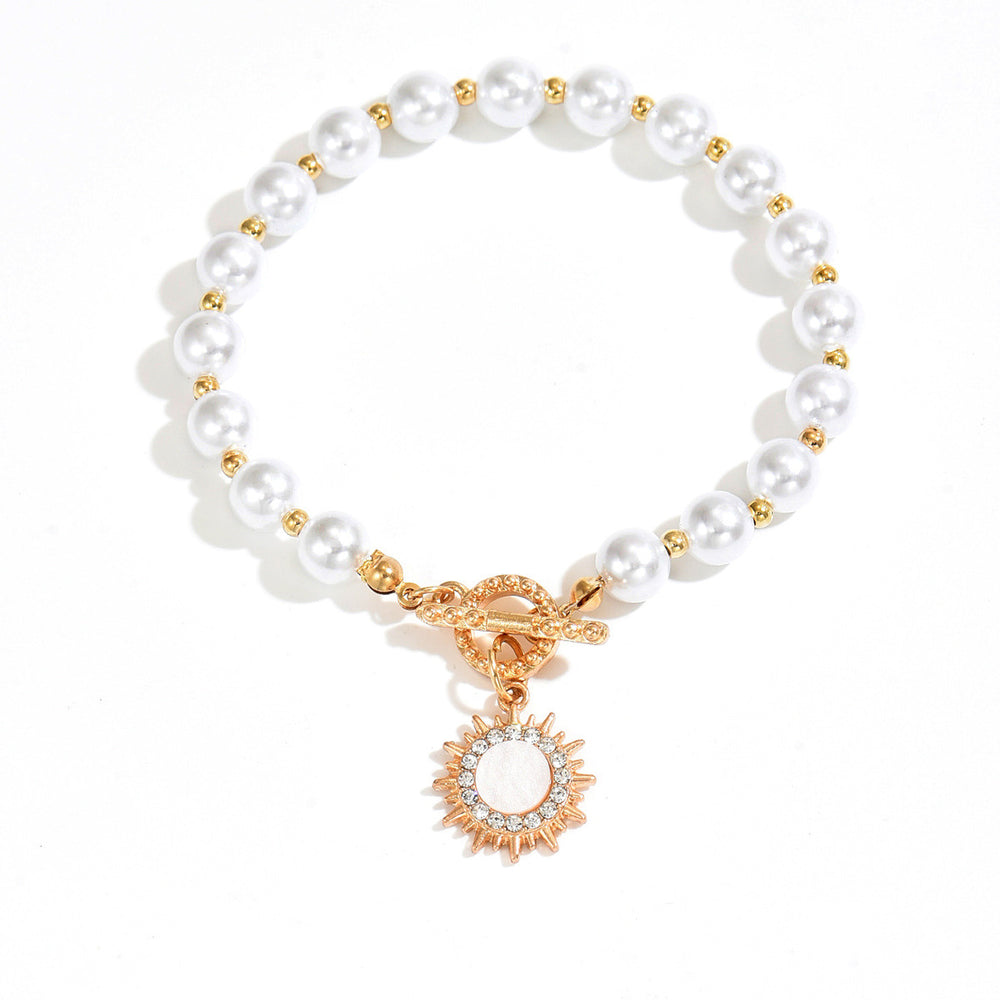 European and american cross-border light luxury retro faux pearl necklace, minimalist chic diamond-studded sun pendant earrings and bracelet set