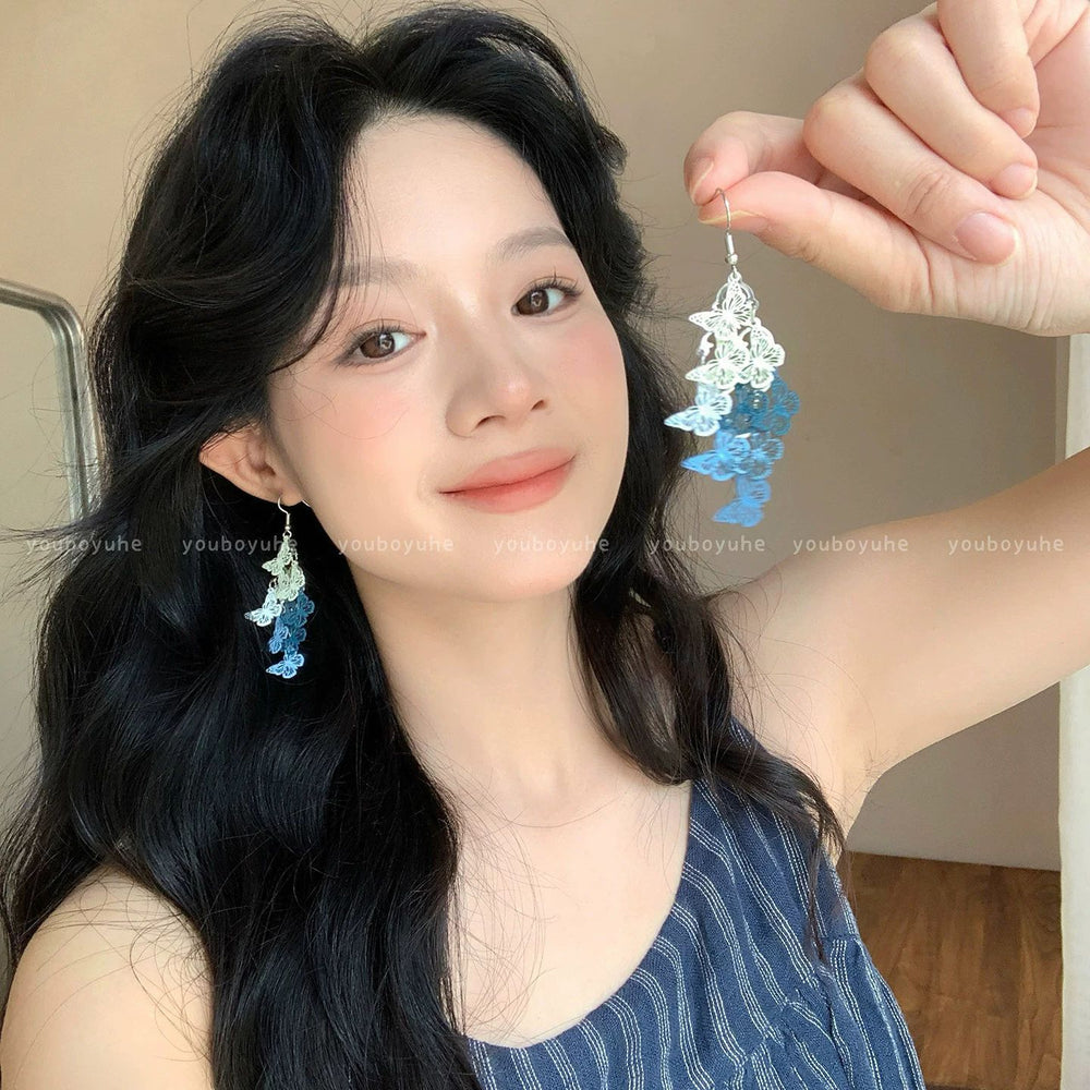 Spring break style white floral earrings - unique dopamine studs, niche design, versatile earrings