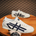 2025 new men's slip-on canvas sneakers, casual shoes, versatile loafers, trendy ins style skate shoes for men