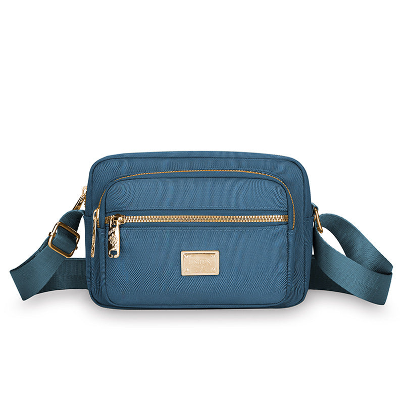 Portable commuter small square bag multi-layer storage business cashier bag simple and durable Oxford cloth shoulder messenger bag wholesale