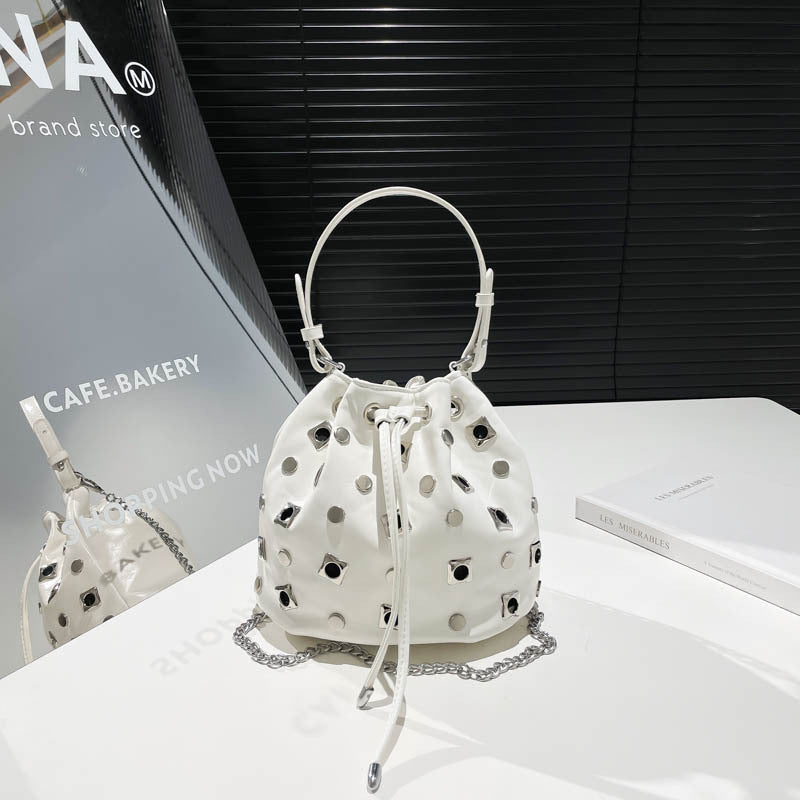 Cross-border super fire niche bucket bag women's 2025 new European and American punk style rivet portable shoulder bag messenger bag