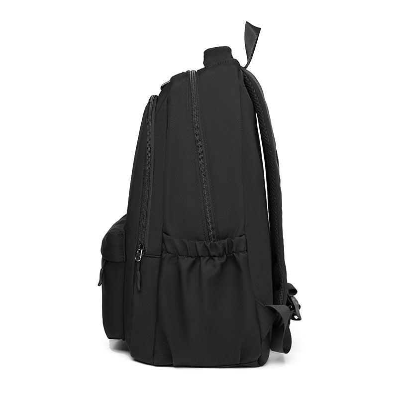 Cross-border fashion large-capacity couple backpack, simple commuter travel backpack, versatile trend high school student schoolbag