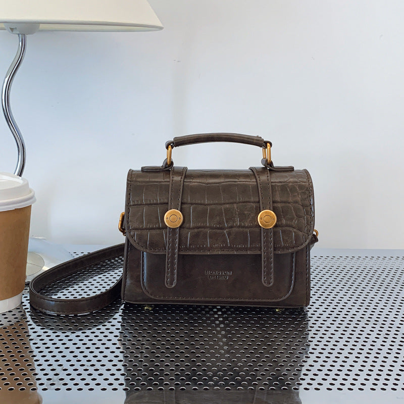 Simple texture college style small square bag women's new 2025 autumn and winter shoulder bag personalized foreign style handbag