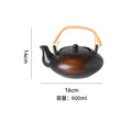 Spray yellow-teapot