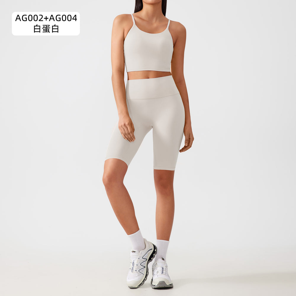 Two-piece yoga outfit set for women: high-waisted, butt-lifting yoga shorts with barely-there, supportive, shock-absorbing sports bra
