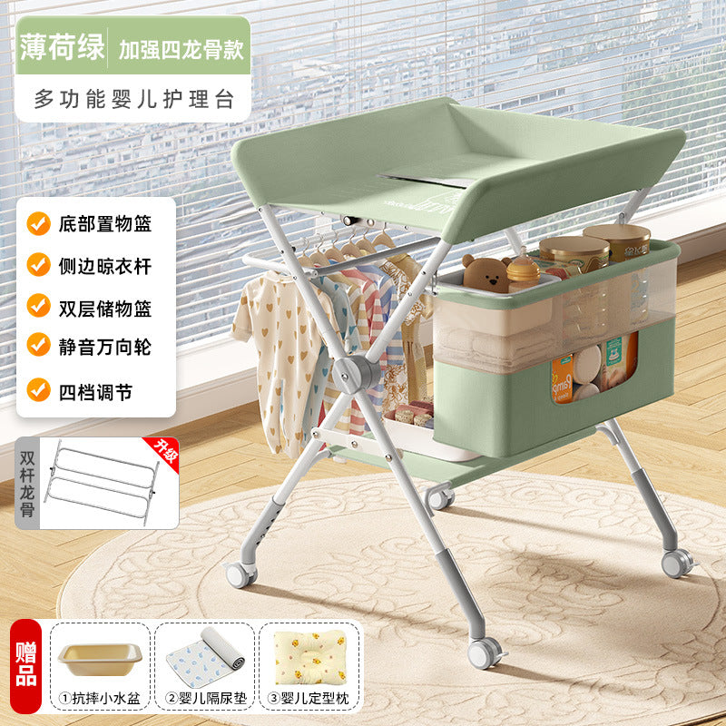 Baby changing table - newborn diaper changing, bathing, massage, and bed - foldable multifunctional baby bed