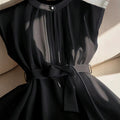 plus size french sleeveless top with stand collar, single button, chest pleat, tie waist, semi-sheer and flowy