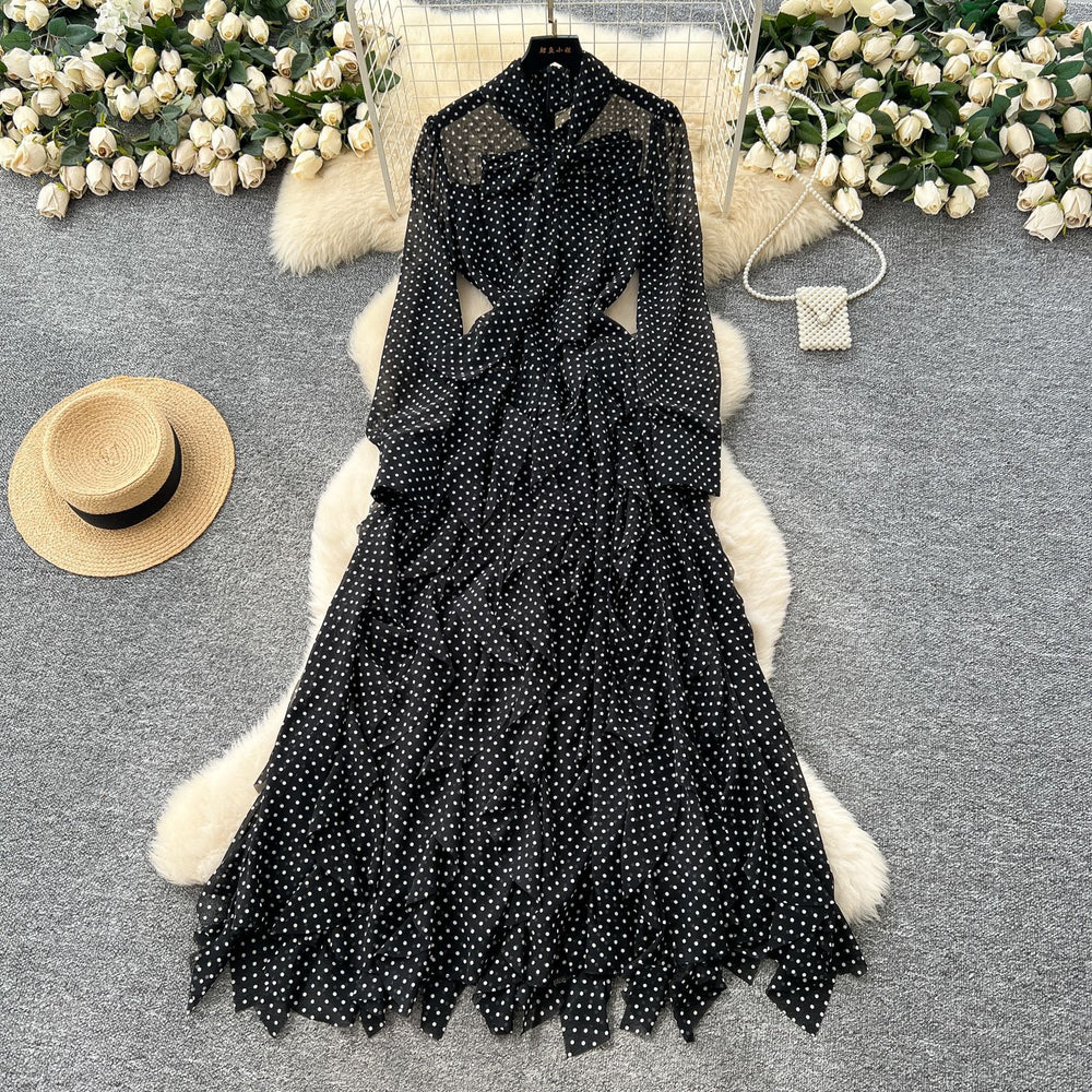 Sophisticated chic: women's polka dot maxi dress with bow tie, asymmetrical ruffle hem - autumn  collection
